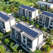 Eco-friendly homes with green spaces and solar panels.
