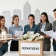 Architects celebrate successful homelessness appeal donation.