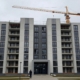 John Lewis housing development halted due to economic issues.